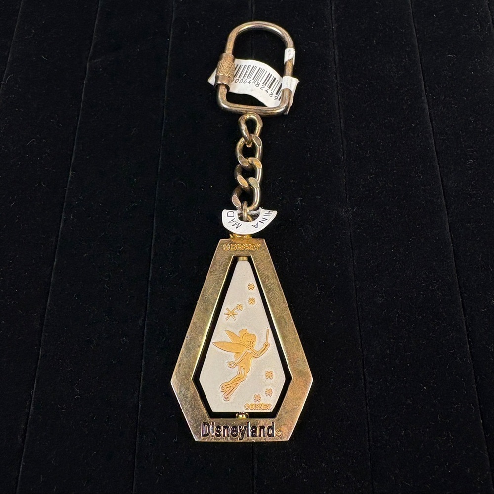 Disney Parks Merchandise Vintage Disney Spinning Keychain Tinkerbell/Castle NWT